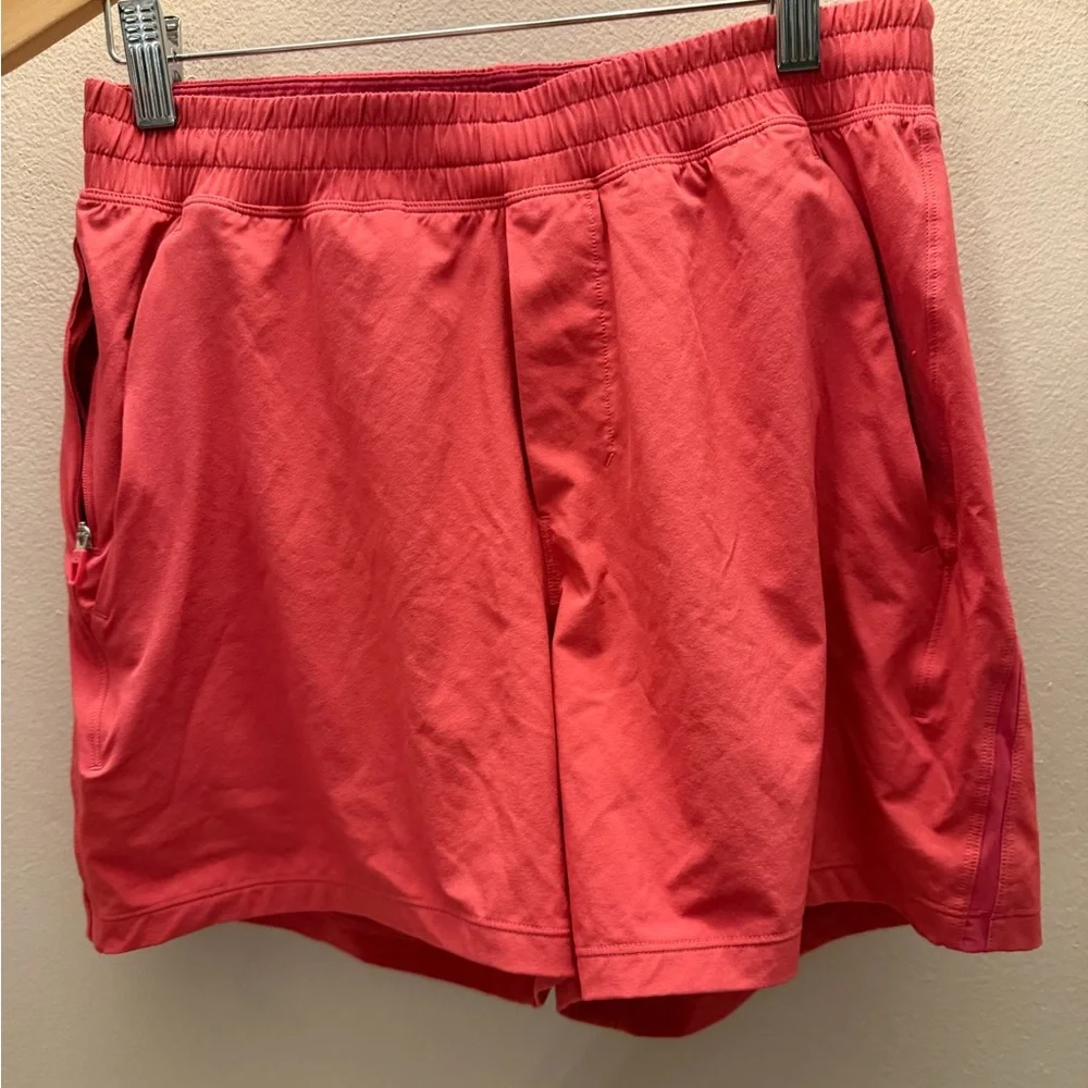 Lululemon Pace Breaker Shorts Coral Pink Mesh Vent Zipper Pockets Size S LM7BC0S